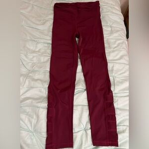 Balera | Large child maroon leggings, mesh details, cross detailing on the back.